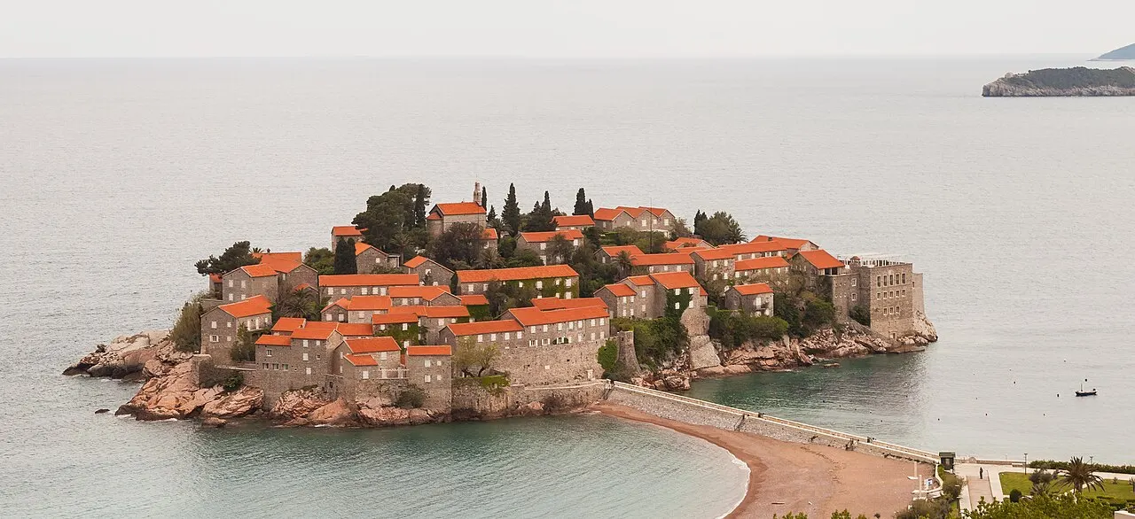 Sveti Stefan's terracotta-roofed islet linked to the mainland by its causeway and beach
