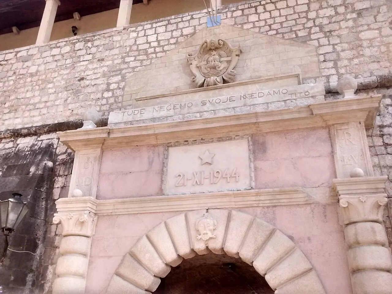 The Sea Gate, the main entrance into Kotor's Old Town, beside the city walls