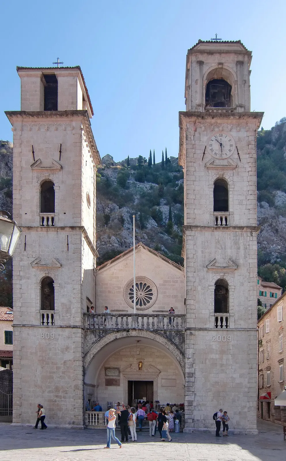 The twin-towered Romanesque facade of St Tryphon Cathedral in Kotor, consecrated 1166