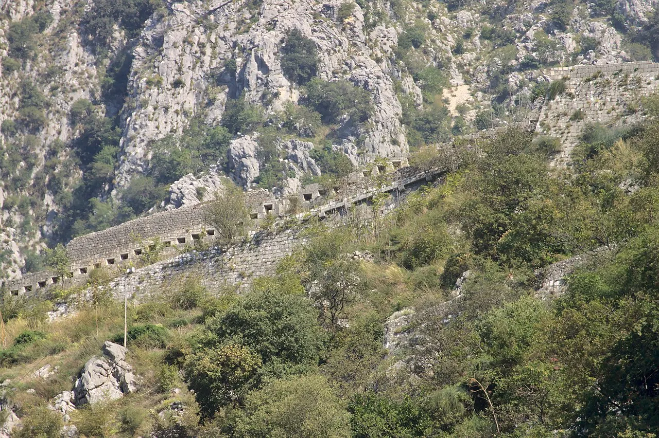 The city-wall path switchbacking up the cliff above Kotor, the bay spread out below