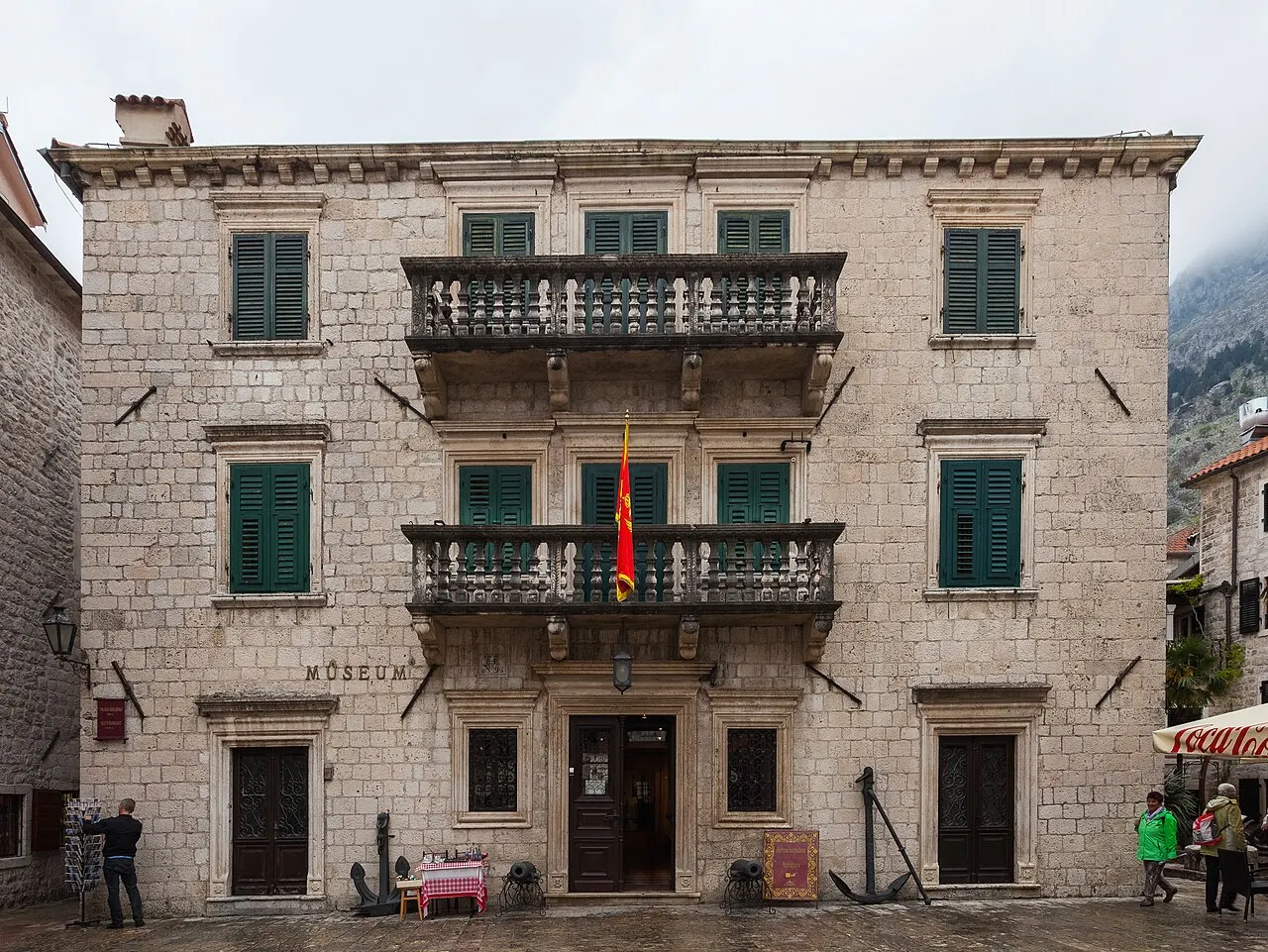 The Maritime Museum on its Old Town square under grey skies