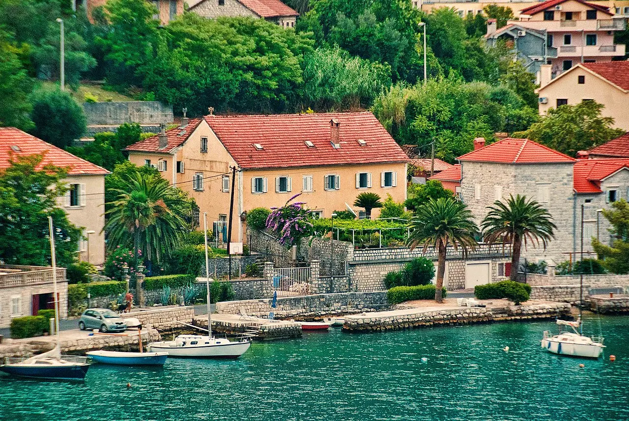 A quiet bay-side house and boats on the waterfront at Dobrota